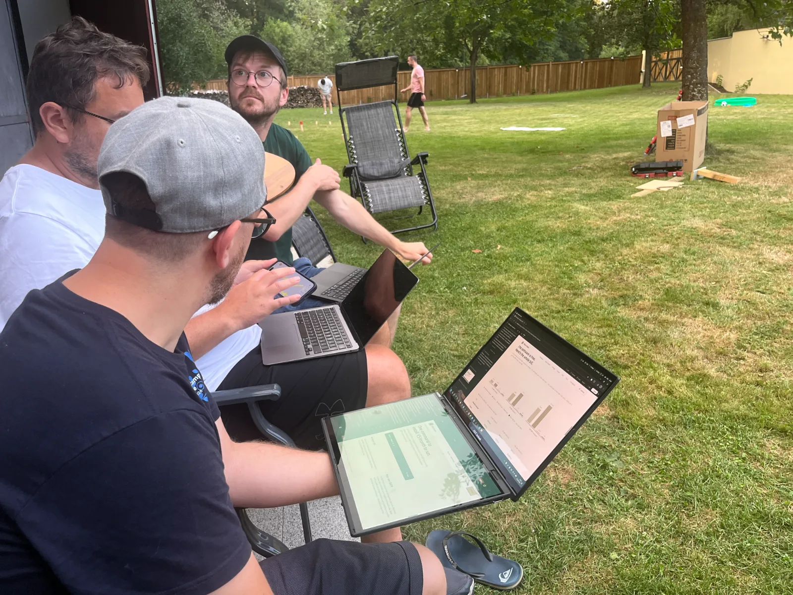 Working on laptops in the garden